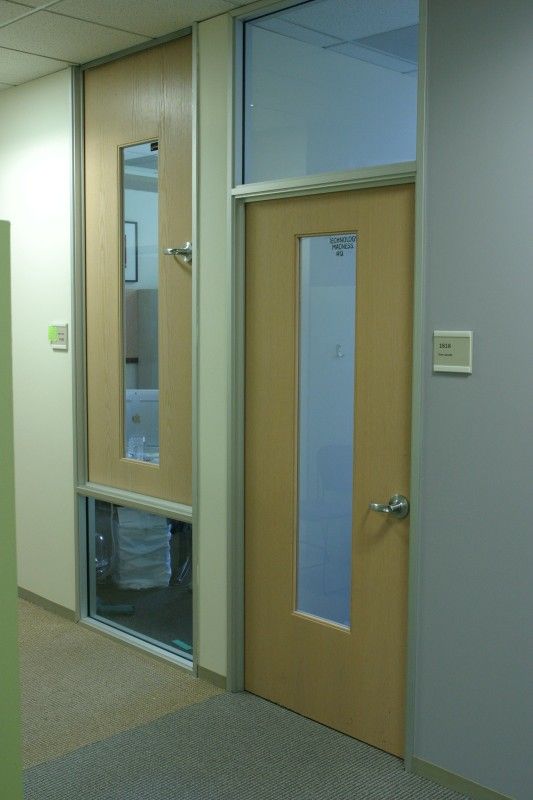 A complete office door, installed upside down
